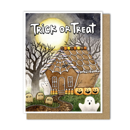 halloween card with a halloween gingerbread house that says "trick-or-treat" on the front with a ghost peep in front