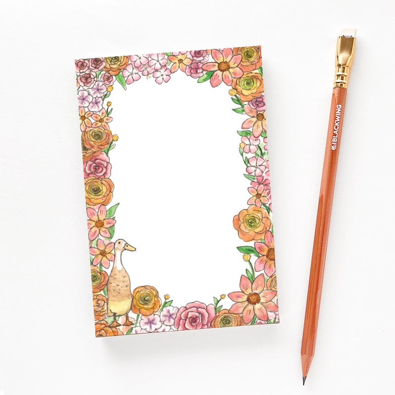 4x6 notepad with a pencil next to it.