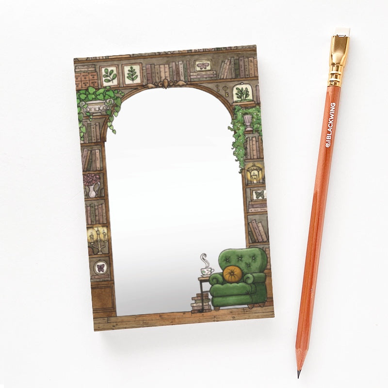 Notepad with a pencil for size comparison.