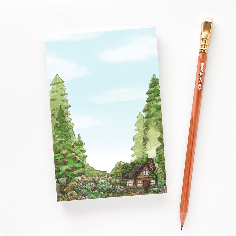 4x6 inch notepad with a pencil for size comparison.