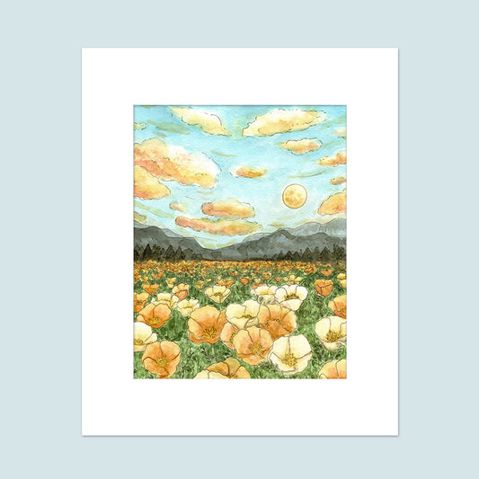A field of california poppies with a moon rising in the background over mountain sillhouettes.