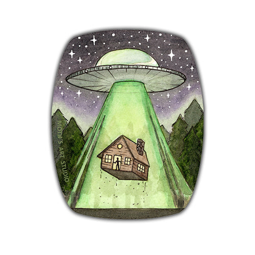 Sticker with a UFO abducting a cabin in the forest with a rounded rectangle oval shape