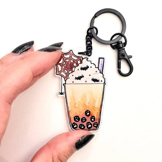 Keychain of a Halloween themed boba drink with a matte black chain.