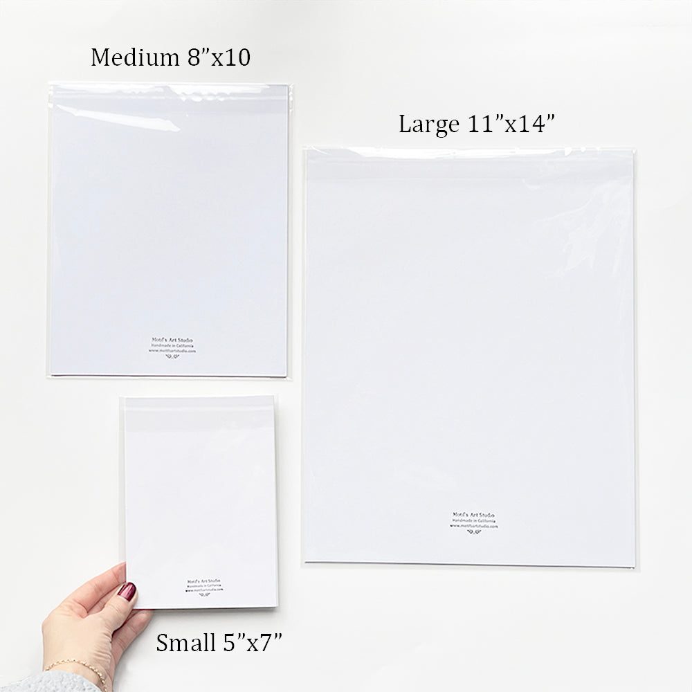 Examples of different art print sizes available: 5x7, 8x10, 11x14 with a hand for size reference.