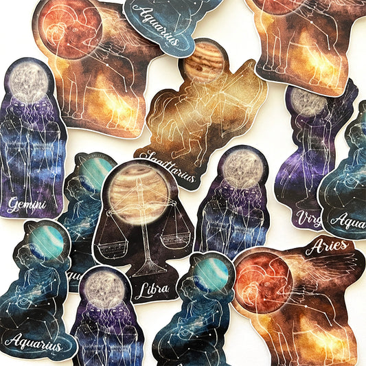 A variety of colorful astrology stickers.