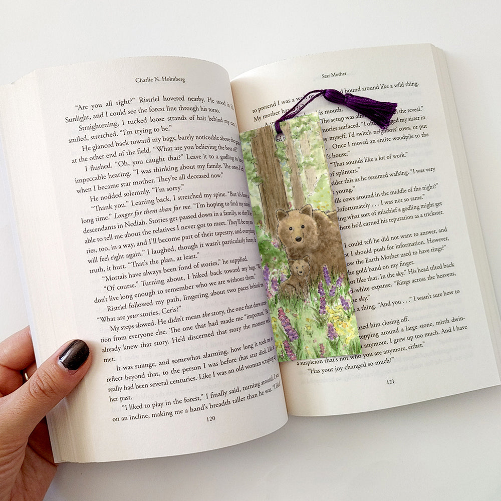 Example of the bookmark with purple tassel being in use.