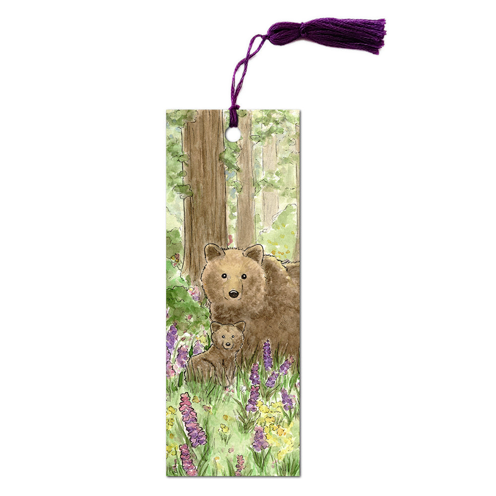 A cute brown bear with her cub surrounded by purple and yellow wildflowers in the peaceful forest.
