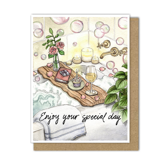 Birthday greeting card with an inviting bubble bath, a glass of wine, roses in vase, a book to read, and a birthday cupcake to celebrate someone special's day.