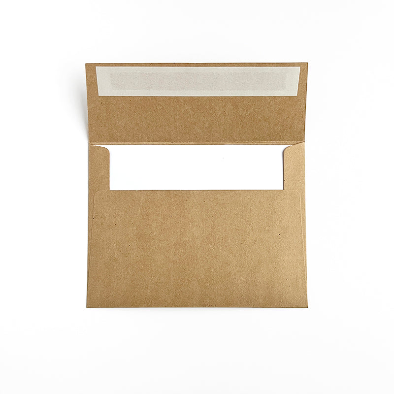 Self-sealing kraft paper envelope showing how the greeting card looks inside.