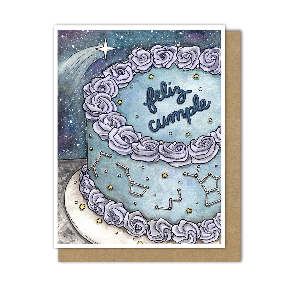 Astrology birthday cake with rose borders and constellations, with feliz cumple written on the top of the cake.