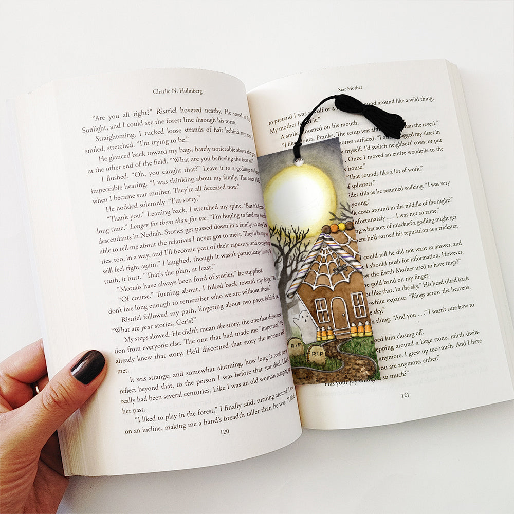example of using the halloween gingerbread house bookmark with a book