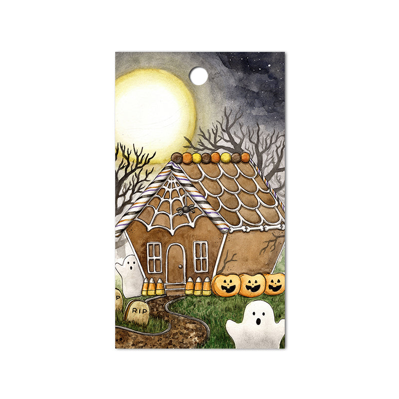 gift tag of a halloween gingerbread house with hole punch for adding string