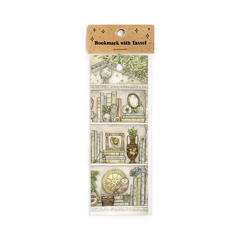 Packaged bookmark with green tassel featuring illustrated scenes on a white background