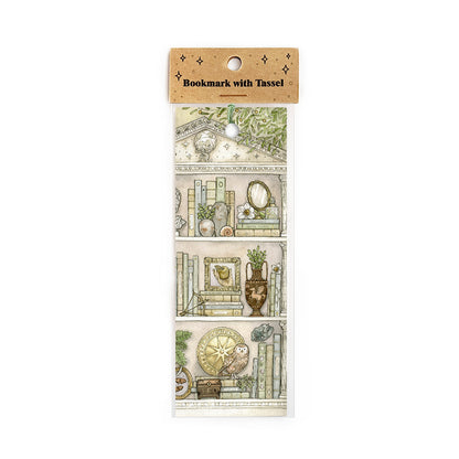 Packaged bookmark with green tassel featuring illustrated scenes on a white background