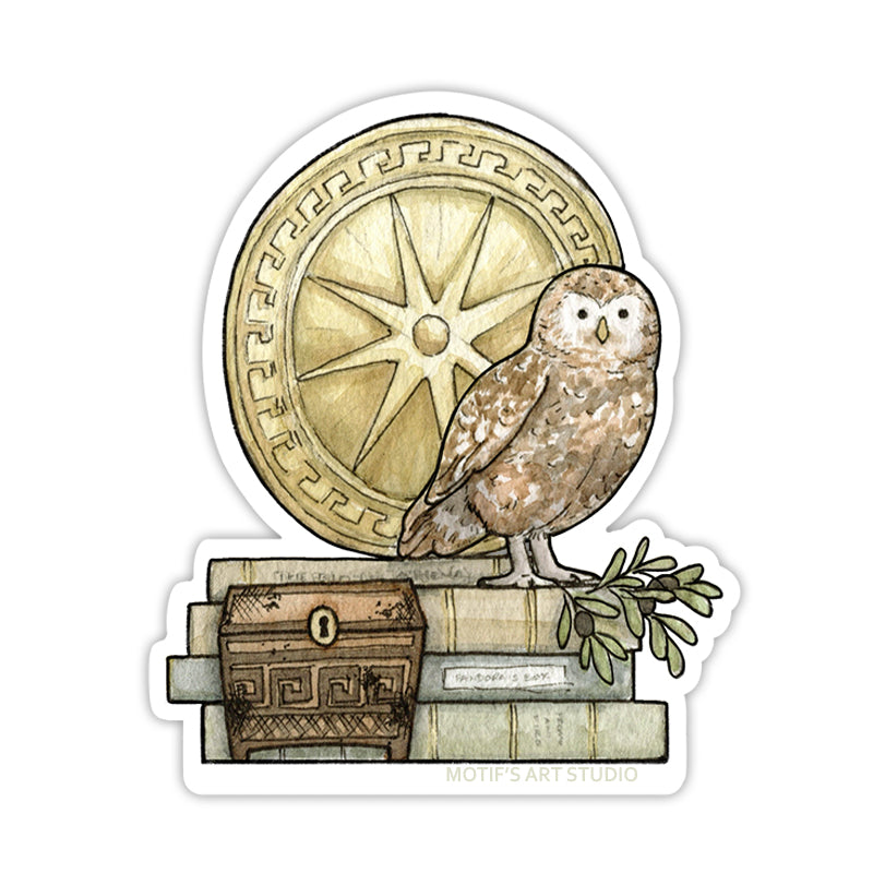 A sticker of Athena's little owl and her shield sit on top of a stack of books with Pandora's Box in front.