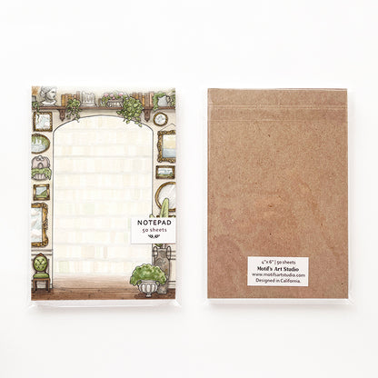 Notepad packaging with a chipboard backing in a cellophane bag.