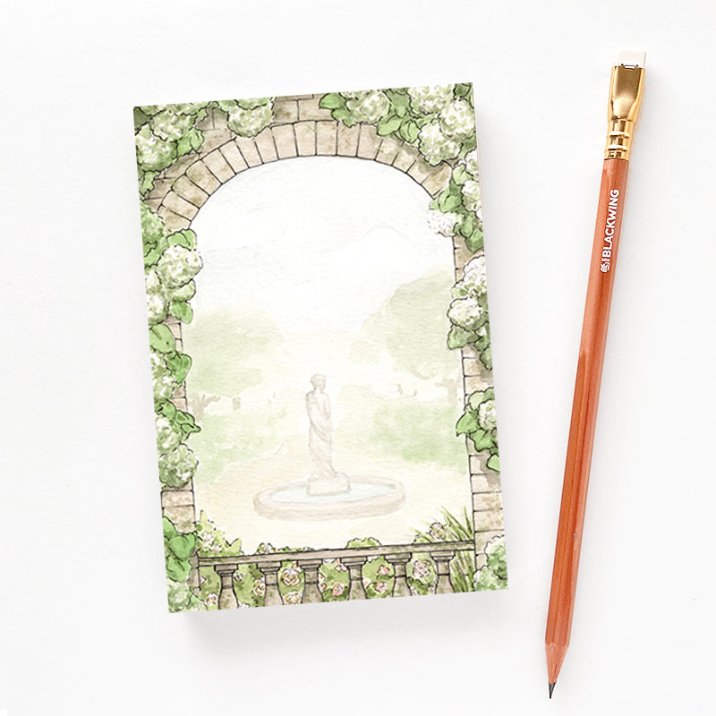 4x6 notepad with garden design next to a pencil for size reference.