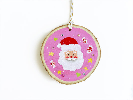 Santa Claus with rosy cheeks, surrounded by colorful rhinestones, stars, hearts, and peppermint candies!